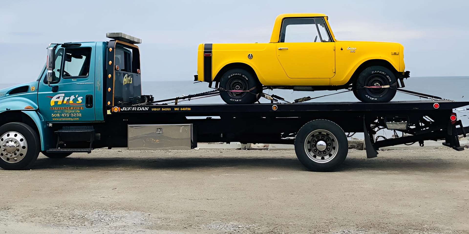 Arts Towing logo